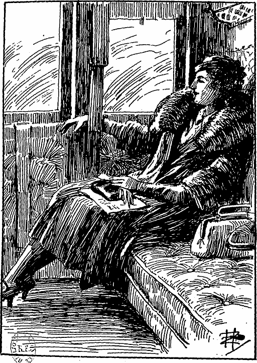 Une femme assise dans le coin d'un wagon, le bras passé dans une brassière.